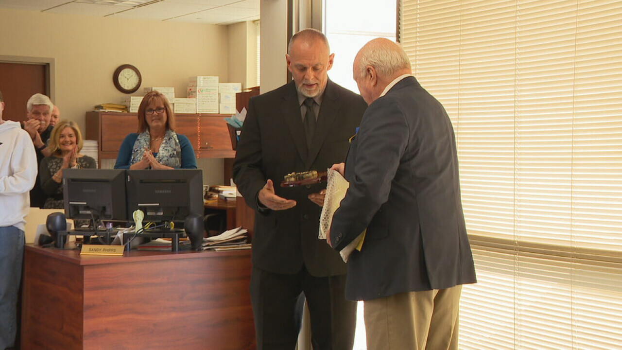 [IMAGE] Investigator honored for work that brought a cold-case rapist to justice